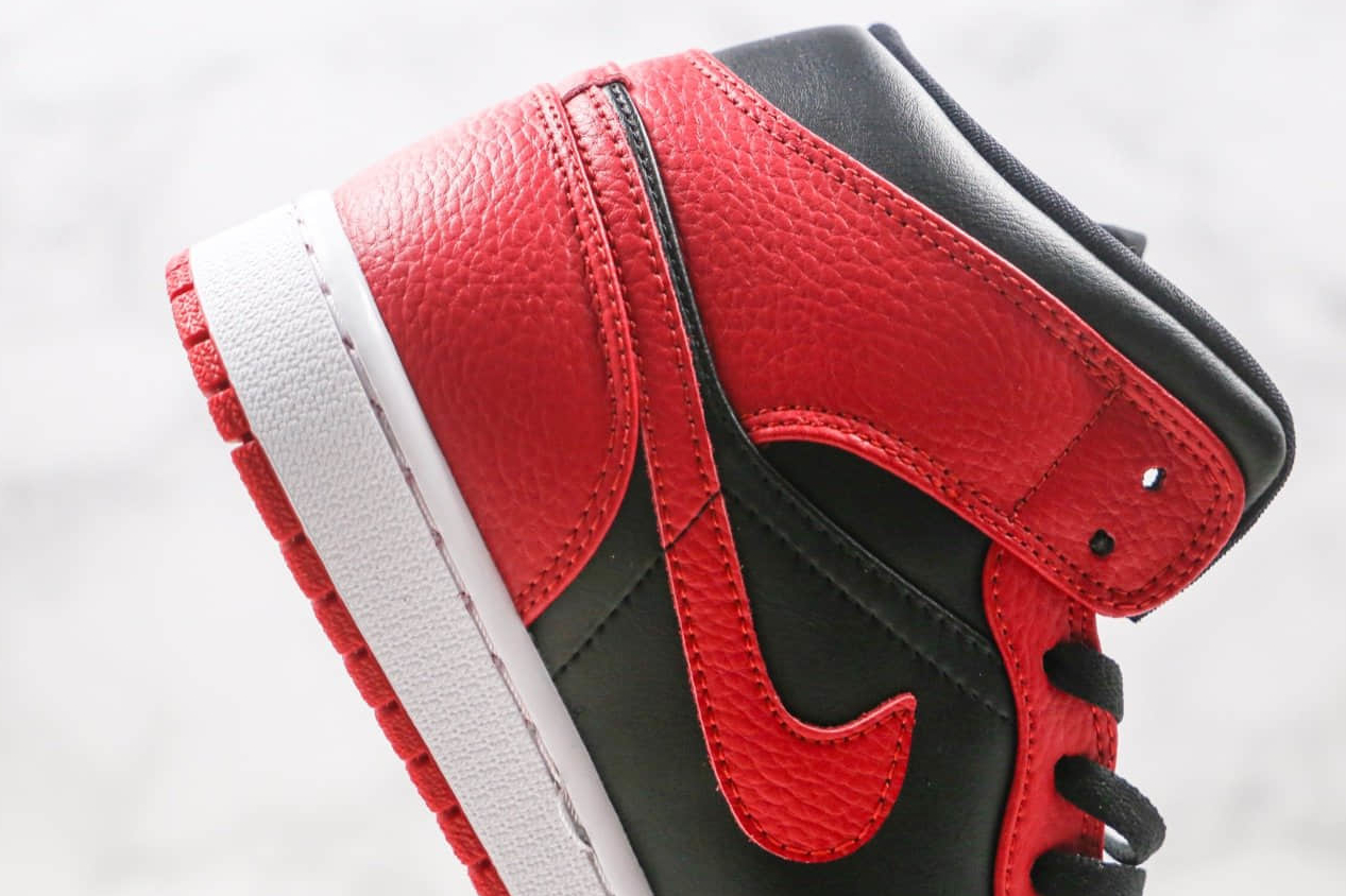 Air Jordan 1 Mid 'Banned' 554724-074 Sneaker - Authentic Retro Design.